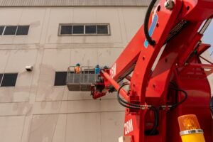 worker-man-working-with-telescopic-boom-lifts-work-2023-11-27-05-09-19-utc